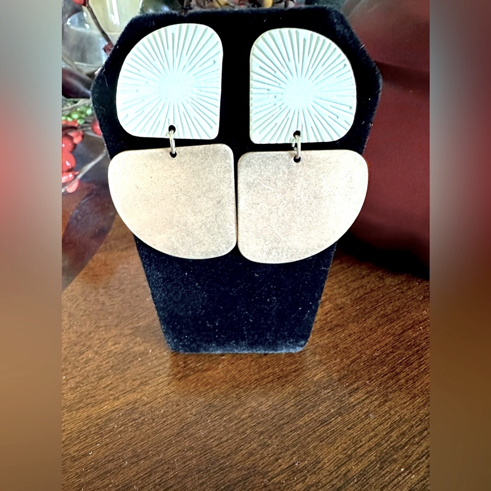 Earrings for pierced ears. Fashion 2 piece dangle ivory top gold tone bottom